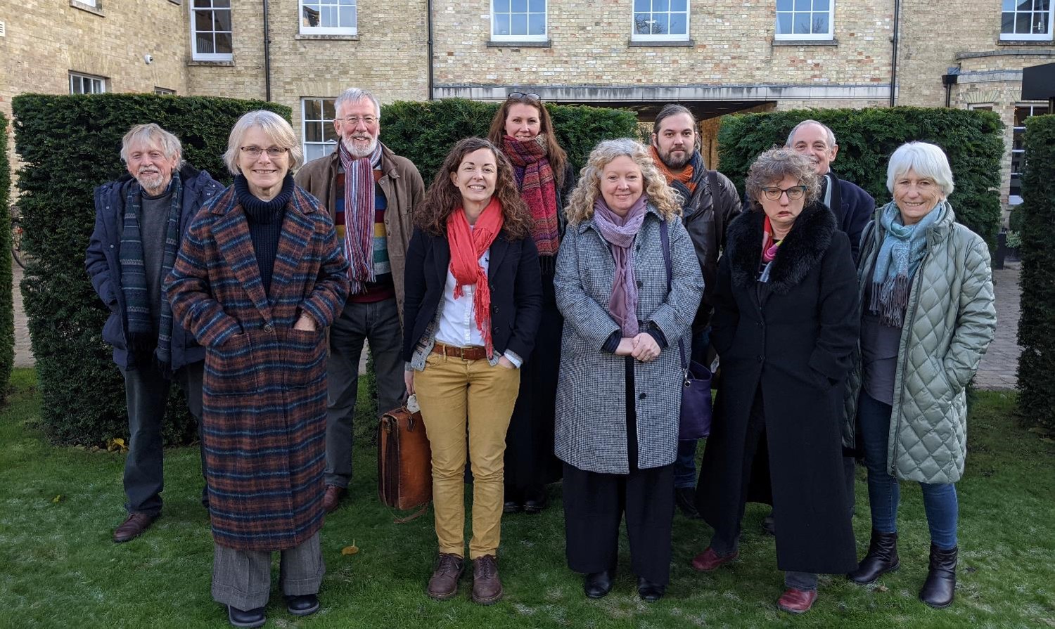 Group photo of the trustees standing outside